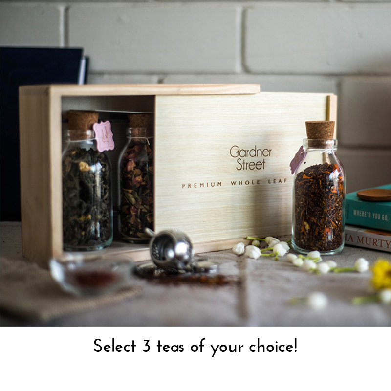 Rustic Pinewood Box with Glass Bottles